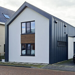 wit-gestucte-schuurwoning